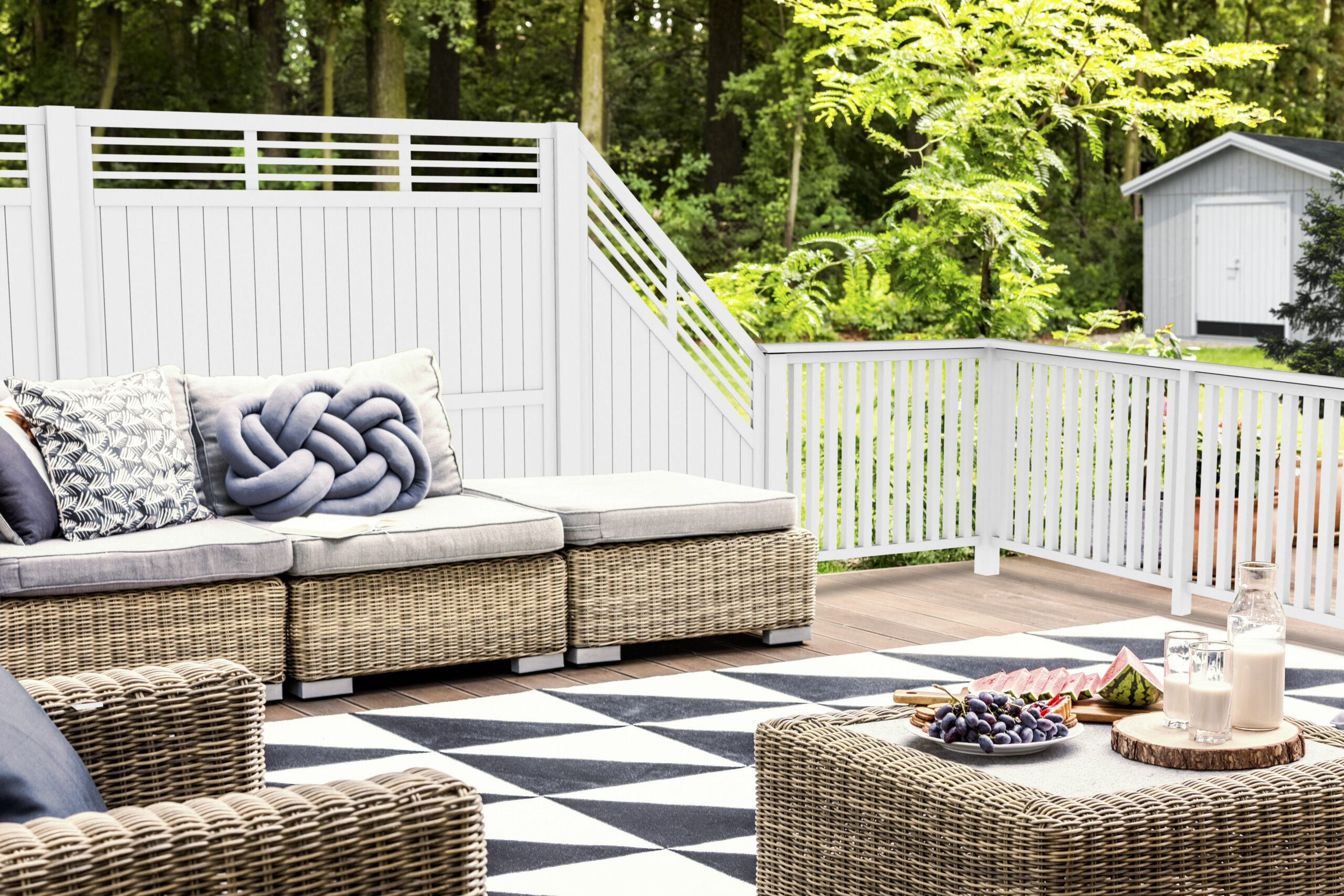 Patio surrounded by green grass